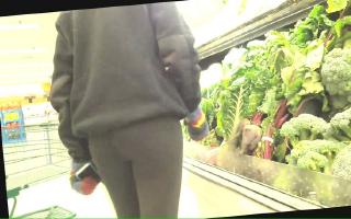 Teen checking out the veggies in yogas