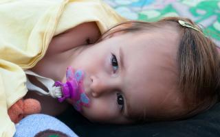 Little Girls with Pacifier and beautiful Eyes 2