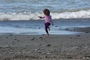 Girl dancing on beach